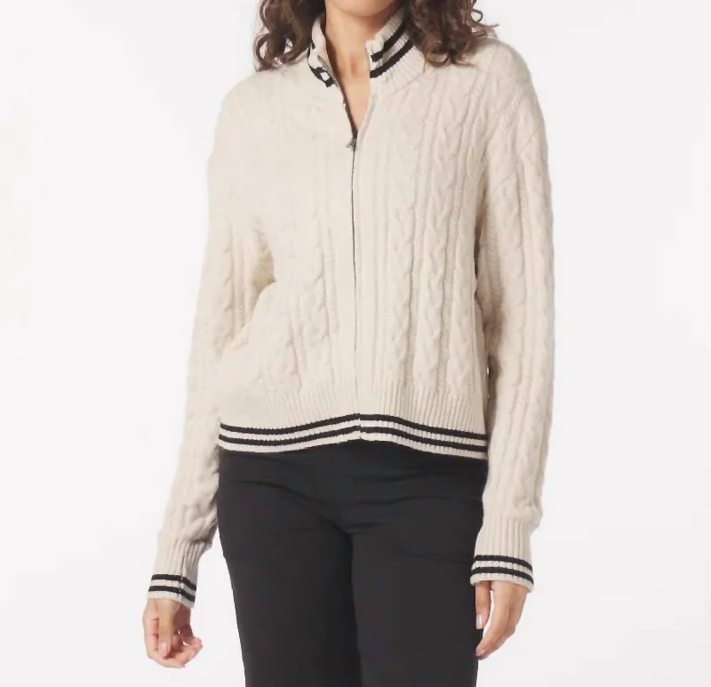 Leisure Cable Knit Zip Up Sweater In Oatmilk/black